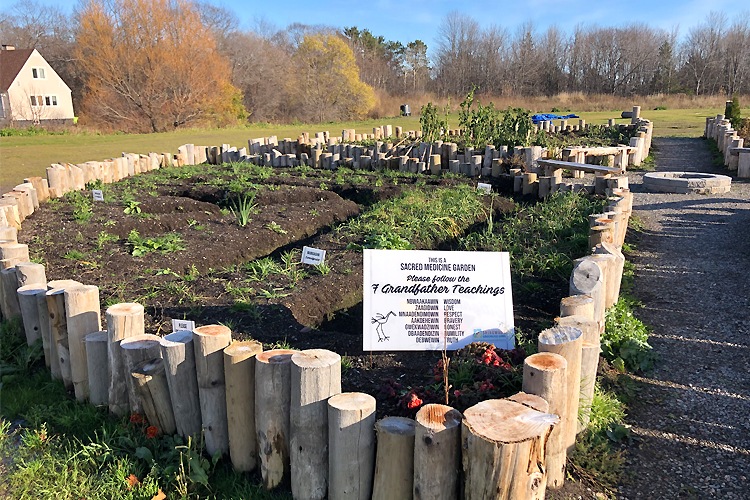 photo: A sacred medicine garden at Shingwauk Kinoomaage Gamig (Reid Locklin)